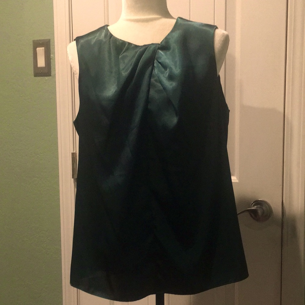 Calvin Klein dark green blouse feels like satin, doesn’t have size tag
